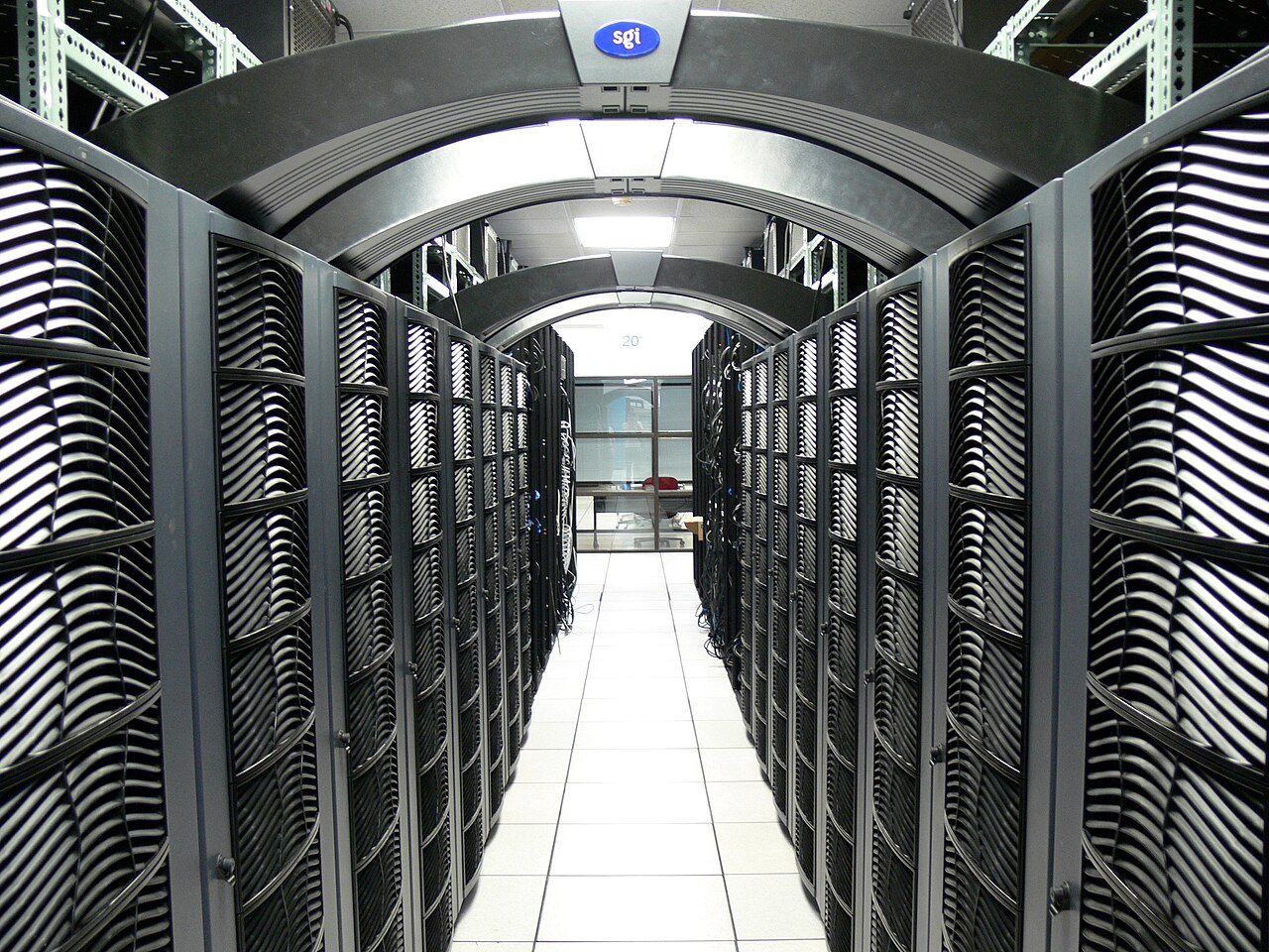 Rows of server racks in a university data center room in the United States