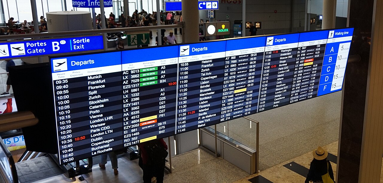 Flight departure board at Geneva Airport